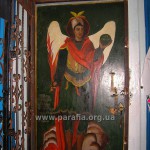 Святий Архистратиг Михаїл, народна ікона на вхідних дверях, 1848 р. Ви тільки подивіться на гетьманську шапку небесного полководця!